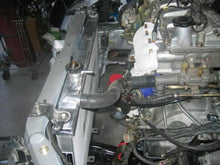 Load image into Gallery viewer, Mishimoto 01-03 Mazda Protege Manual Aluminum Radiator **Requires Modification** - eliteracefab.com