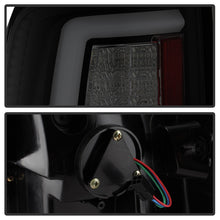 Load image into Gallery viewer, Spyder 13-14 Dodge Ram 1500 Light Bar LED Tail Lights - Black Smoke ALT-YD-DRAM13V2-LED-BSM - eliteracefab.com