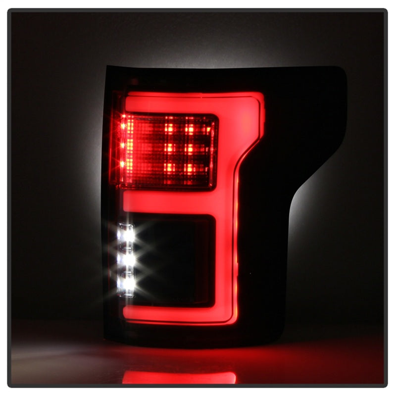 Spyder 15-18 Ford F-150 Light Bar LED Tail Lights (w/Blind Spot) - Black (ALT-YD-FF15015BS-LBLED-BK) - eliteracefab.com