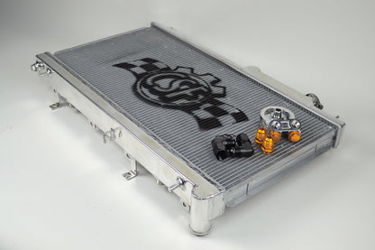 CSF 7042O polished all-aluminum race radiator with built-in oil cooler for Subaru WRX and STI