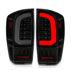 ANZO 16-21 Toyota Tacoma LED Tail Lights - w/ Light Bar Sequential Black Housing & Smoke Lens - eliteracefab.com