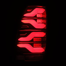 Load image into Gallery viewer, AlphaRex 05-15 Toyota Tacoma LUXX LED Taillights Blk/Red w/Activ Light/Seq Signal - eliteracefab.com