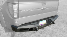 Load image into Gallery viewer, Addictive Desert Designs 10-14 Ford F-150 Raptor HoneyBadger Rear Bumper w/ Tow Hooks - eliteracefab.com