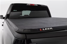 Load image into Gallery viewer, LEER 2019+ Dodge Ram LATITUDE Classic 5Ft7In Tonneau Cover - Folding Full Size Short Bed