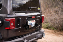 Load image into Gallery viewer, DV8 Offroad 18-22 Jeep Wrangler JL Spare Tire Delete Kit w/Light Mounts DV8 Offroad