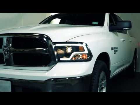 ANZO 2009-2018 Dodge Ram 1500 Crystal Headlights w/ Light Bar Black Housing - eliteracefab.com